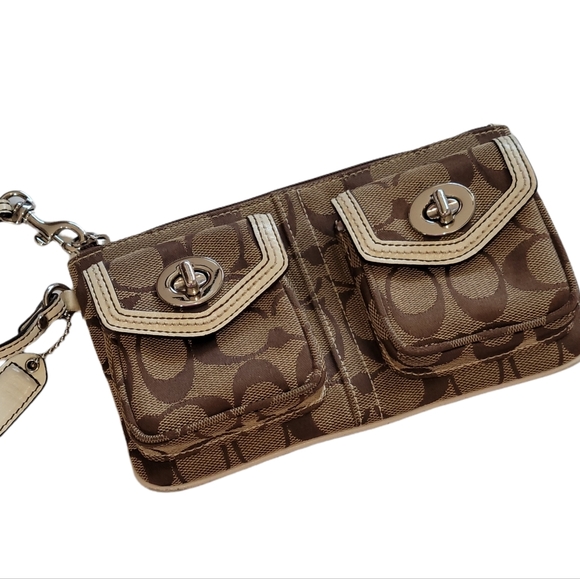 Coach Handbags - Coach Wristlet Signature Canvas Silver Turnlock Leather Trim